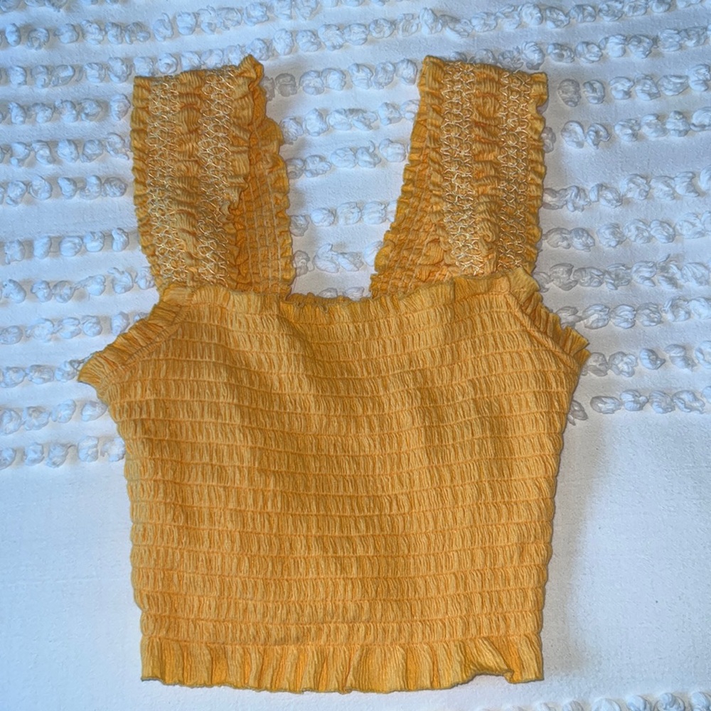 Yellow rouge top. Fits true to size